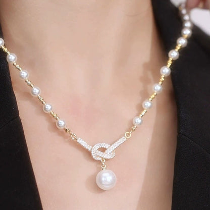 💜 Pearl Concentric Knot Necklace