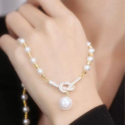 💜 Pearl Concentric Knot Necklace