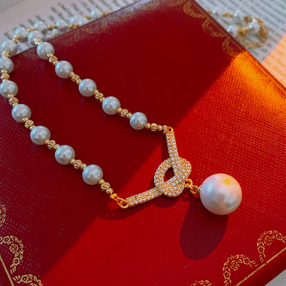 💜 Pearl Concentric Knot Necklace