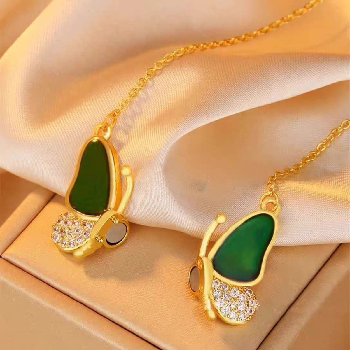 Golden thermochromic magnetic butterfly necklace